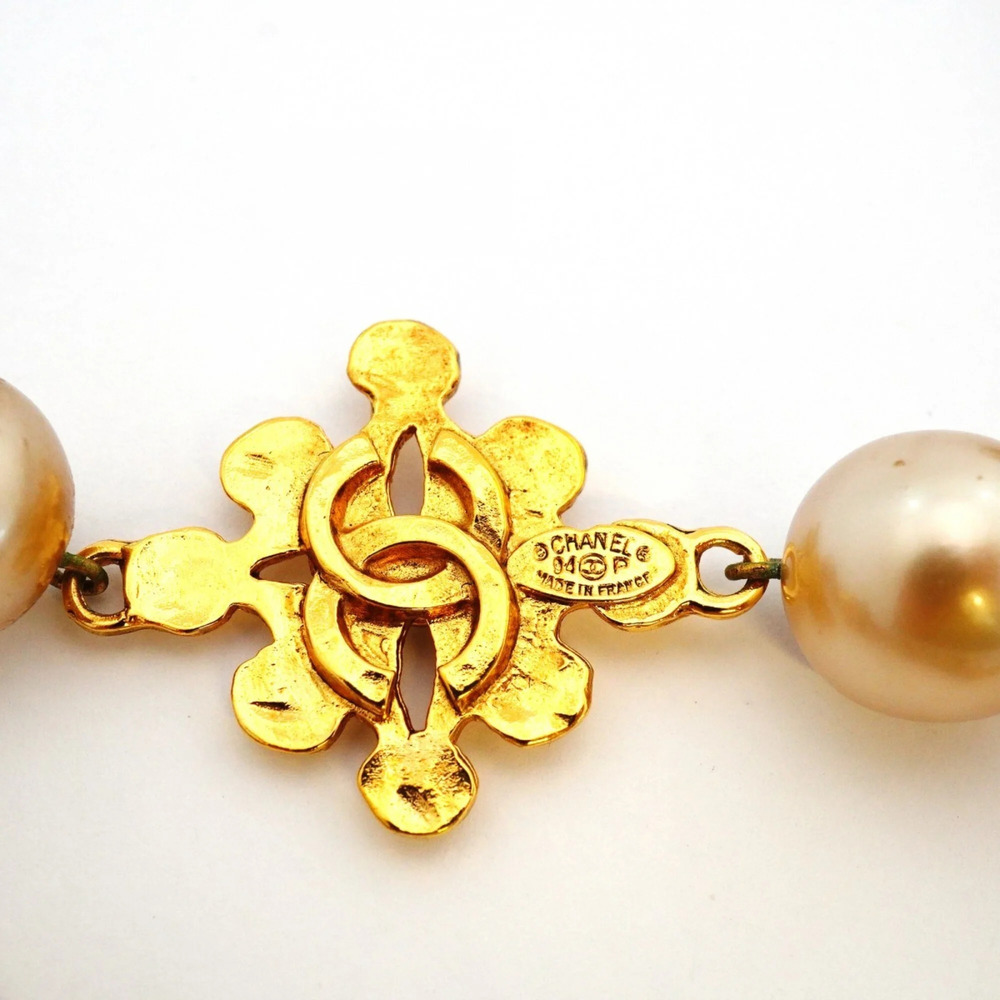 CHANEL Gold Pearl Logo Necklace - Picture 5 of 8